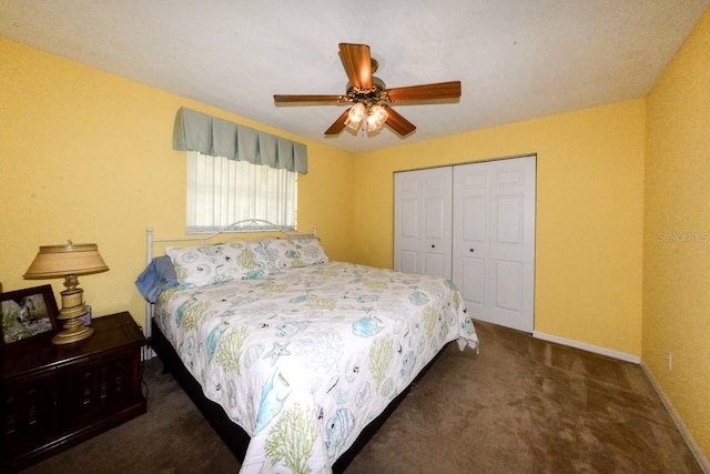 carpeted bedroom featuring a closet and ceiling fan