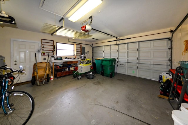 garage featuring a garage door opener