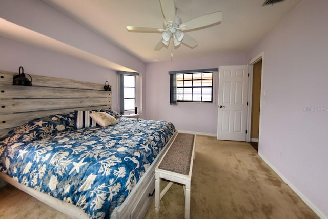 bedroom with light colored carpet and ceiling fan