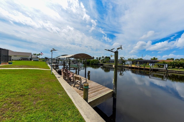 dock area featuring a yard and a water view