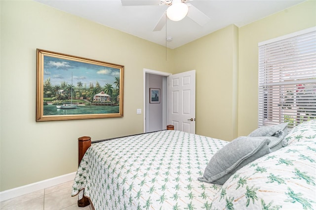 bedroom featuring ceiling fan and light tile patterned floors