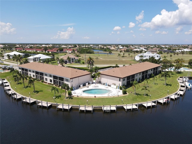 bird's eye view with a water view