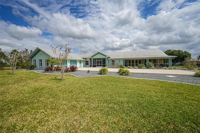 ranch-style house with a front lawn