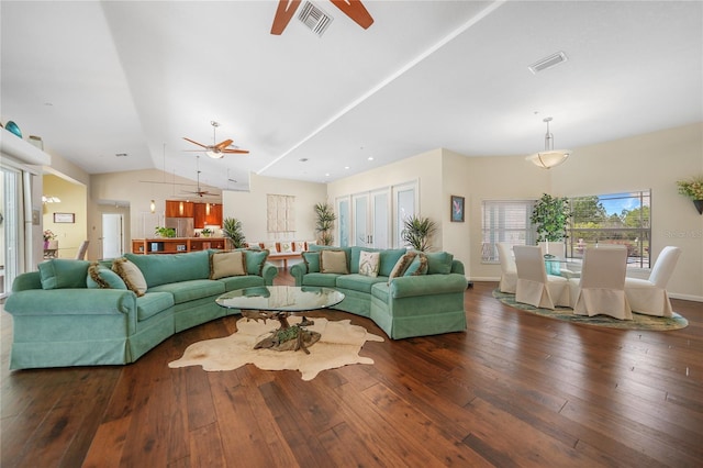 living room with vaulted ceiling, ceiling fan, and dark hardwood / wood-style flooring