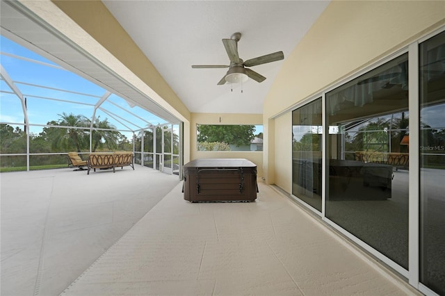 sunroom / solarium featuring ceiling fan