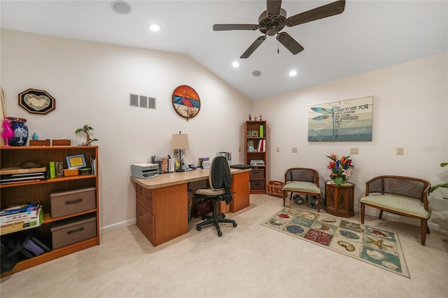 carpeted home office with lofted ceiling and ceiling fan