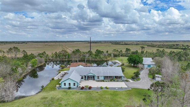 bird's eye view featuring a rural view and a water view