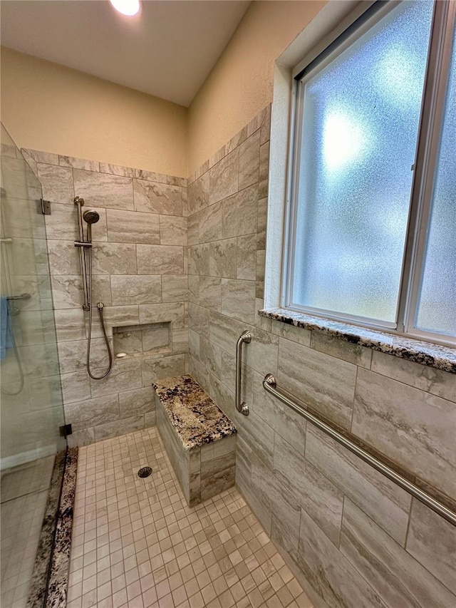 bathroom featuring walk in shower