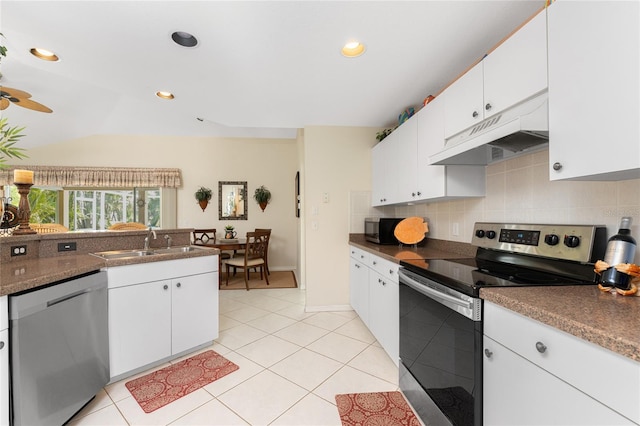 kitchen with white cabinets, stainless steel appliances, ceiling fan, and sink