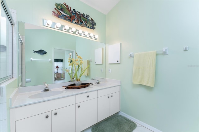 bathroom with tile flooring and dual vanity