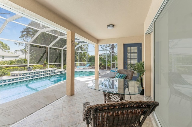 sunroom with a swimming pool