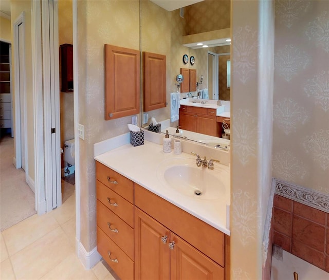 bathroom with tile patterned floors, a shower, vanity, and toilet