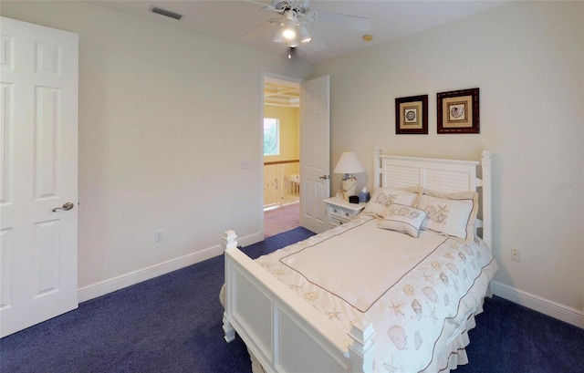 carpeted bedroom with ceiling fan