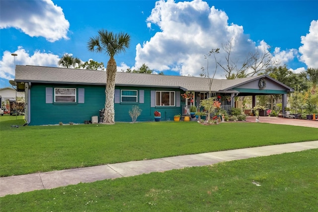 single story home with a front lawn and a gazebo