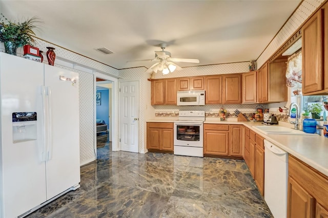 kitchen with ceiling fan, tasteful backsplash, white appliances, dark tile flooring, and sink