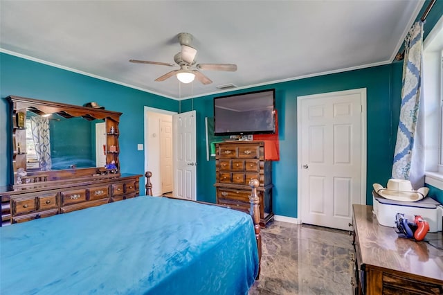 tiled bedroom with ornamental molding and ceiling fan