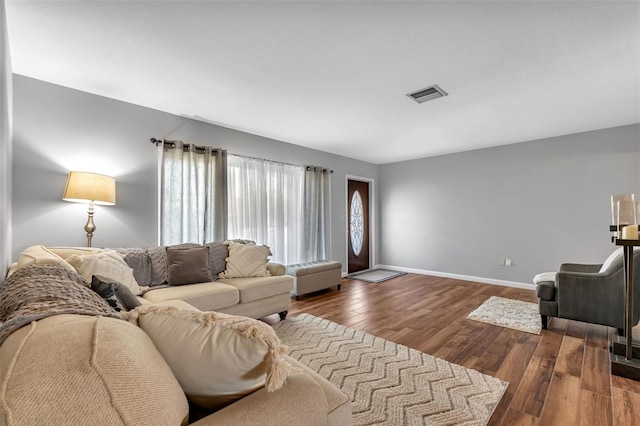 living room featuring dark hardwood / wood-style floors