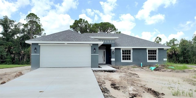 view of front of property with a garage