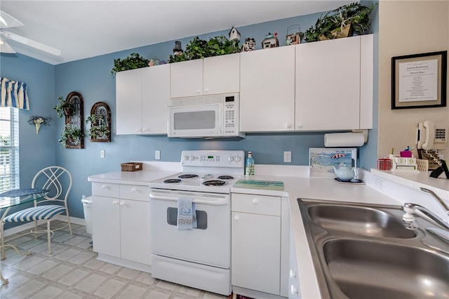 kitchen featuring white cabinetry, ceiling fan, white appliances, and sink