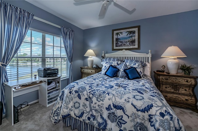 carpeted bedroom with ceiling fan