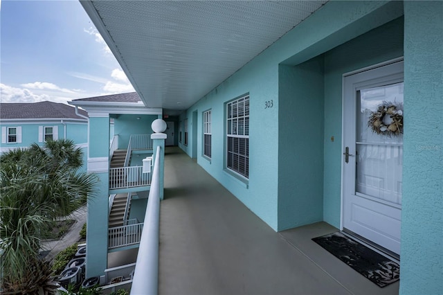 entrance to property featuring a balcony