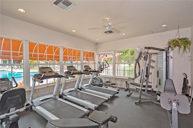 workout area with ceiling fan