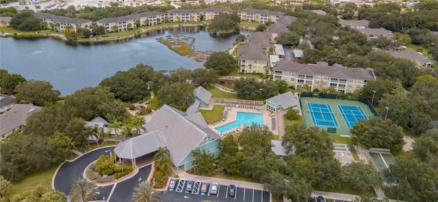 birds eye view of property with a water view