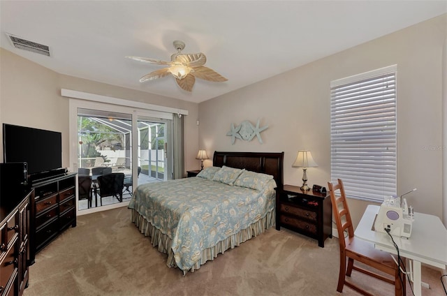 bedroom with light colored carpet, ceiling fan, and access to outside