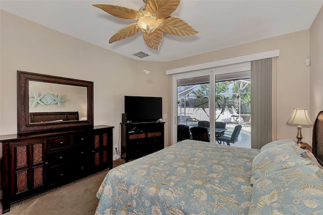 carpeted bedroom featuring ceiling fan and access to exterior