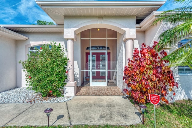 doorway to property featuring french doors