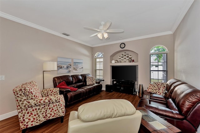 living room with dark hardwood / wood-style floors, ceiling fan, and ornamental molding