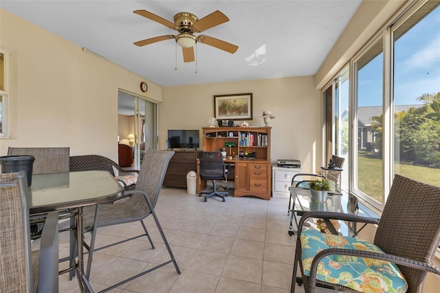 tiled office space with ceiling fan