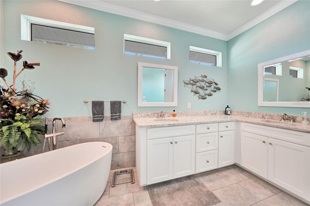 bathroom with tile walls, crown molding, dual vanity, tile flooring, and a bathing tub