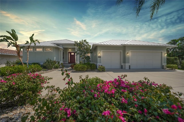 view of front of home with a garage