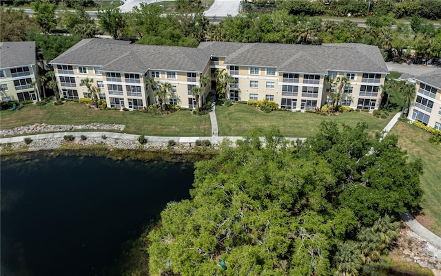 drone / aerial view with a water view