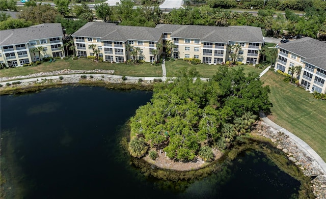 bird's eye view with a water view