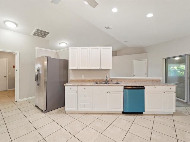 kitchen featuring stainless steel appliances, white cabinets, sink, and light tile floors