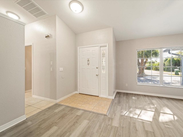 foyer with light wood-type flooring