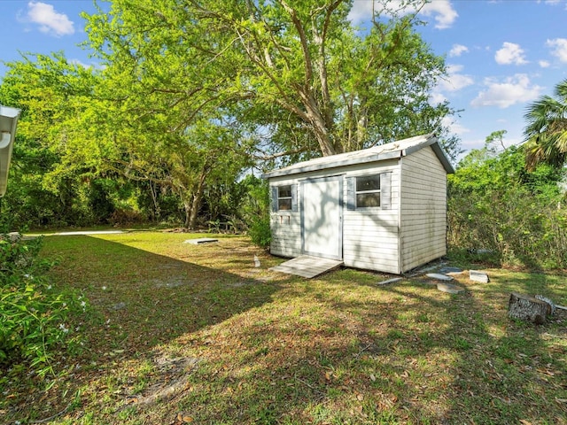 exterior space featuring a shed