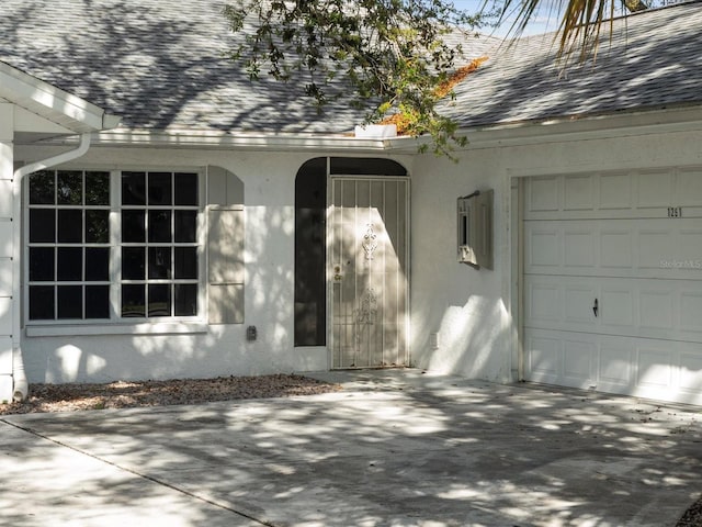 property entrance featuring a garage