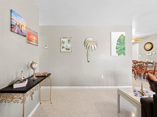 interior space featuring ceiling fan