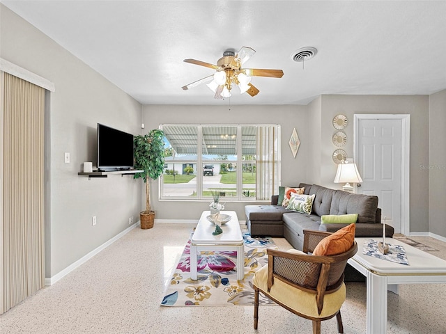 living room featuring ceiling fan