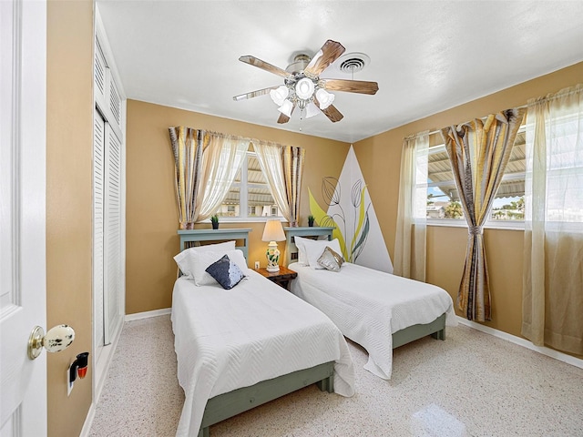 bedroom with a closet and ceiling fan