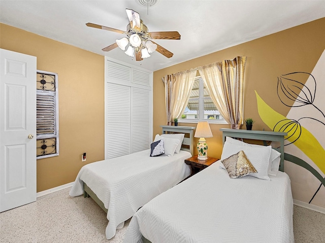 bedroom with a closet and ceiling fan