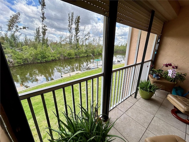 balcony featuring a water view