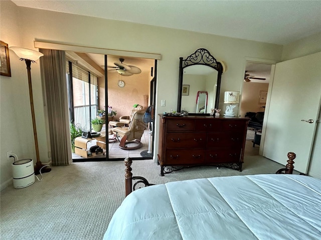 bedroom with light colored carpet and a closet