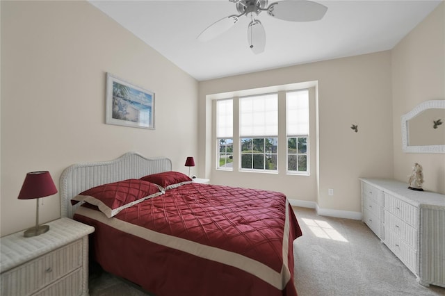 bedroom with light colored carpet and ceiling fan