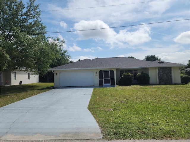 ranch-style home with a front yard and a garage