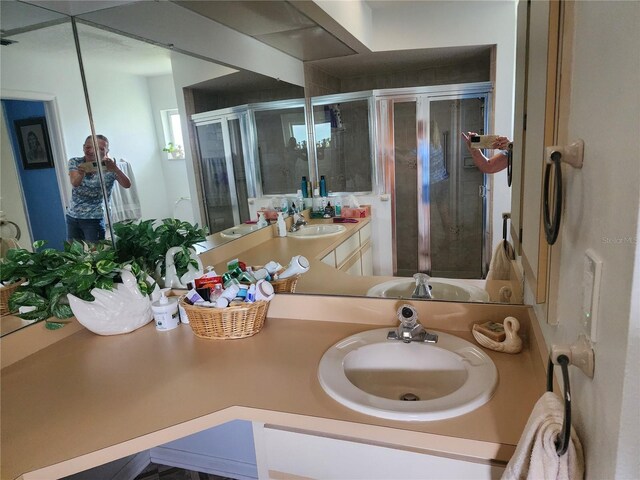 bathroom featuring vanity with extensive cabinet space