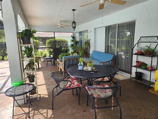 view of patio featuring ceiling fan